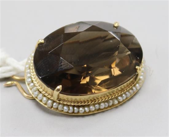 A 14ct gold quartz and seed pearl set oval brooch, 28mm.